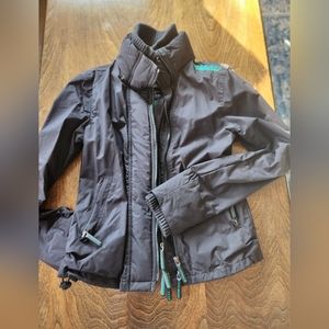 SuperDry windbreaker black and turquoise jacket. Rain repellent. Unisex small